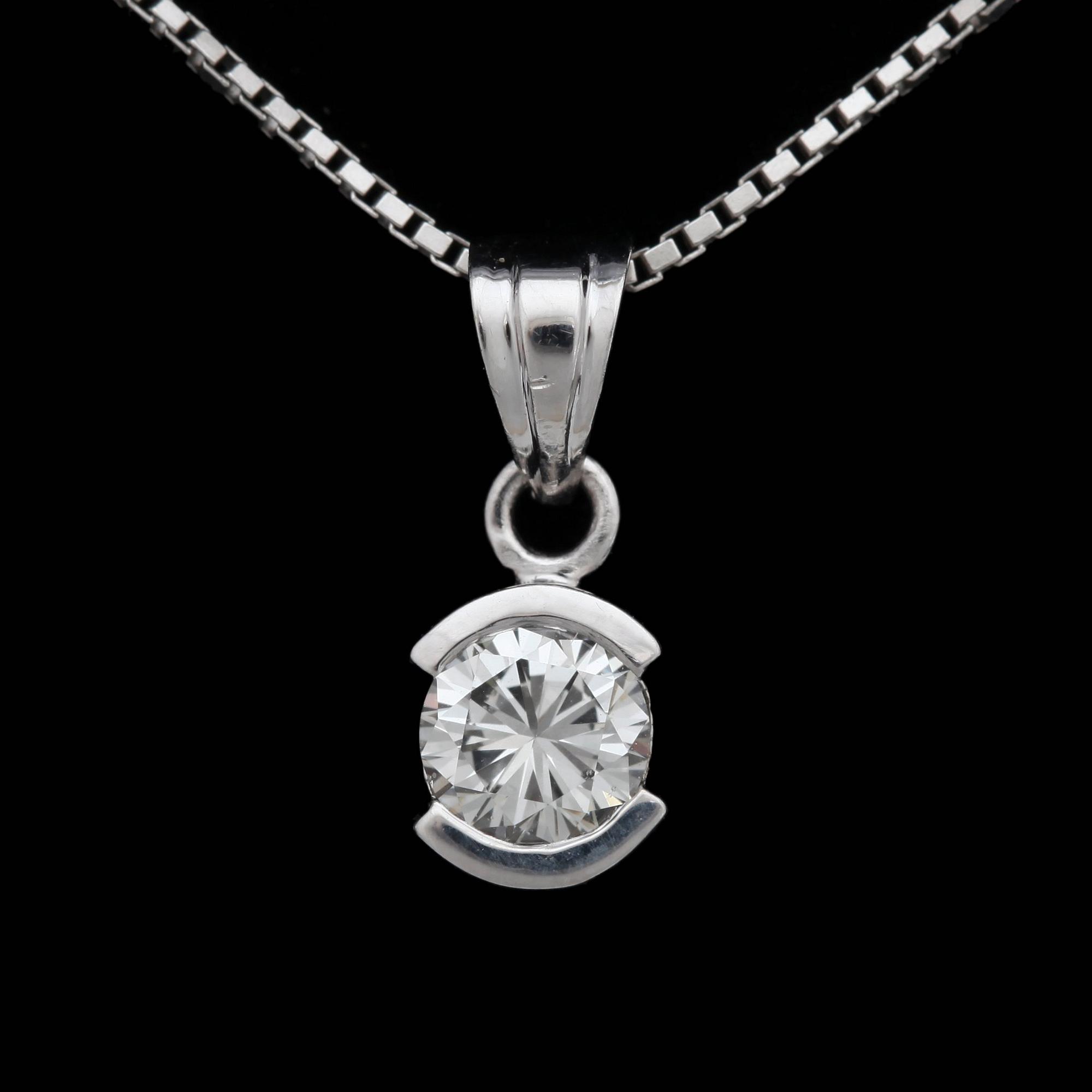 A brilliant cut diamond pendant, app. 0.50. ct.