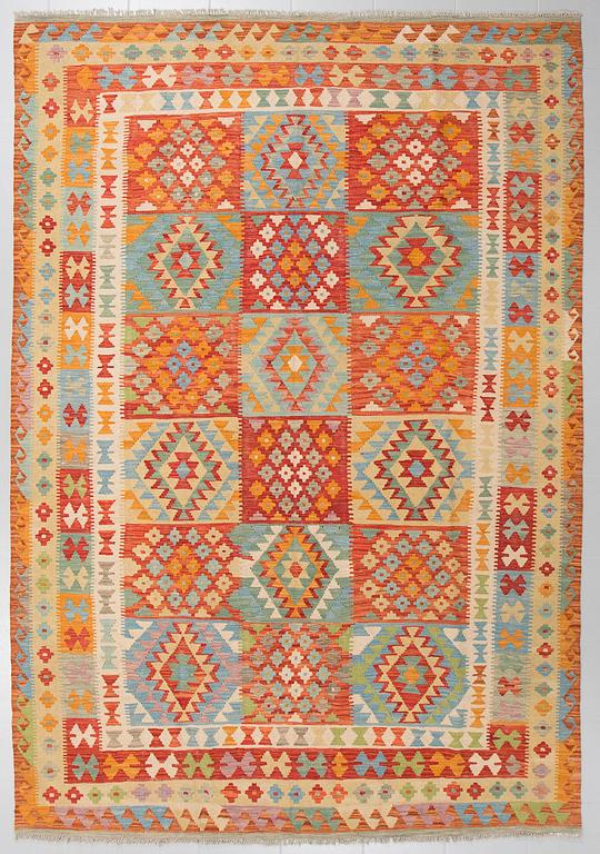 A kelim rug, 303 x 205 cm.