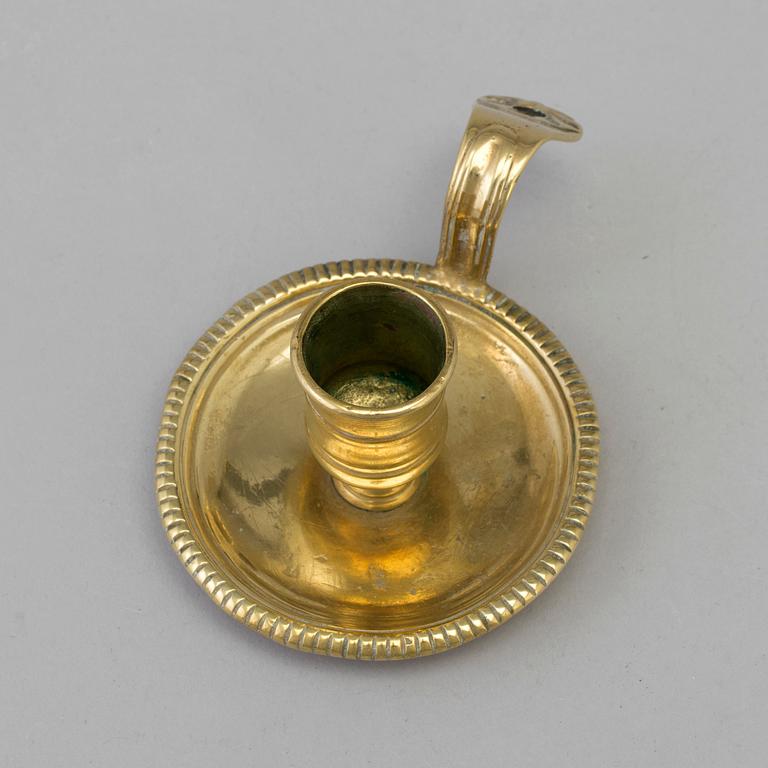 AN 18TH CENTURY BRONZE NIGHT LIGHT.