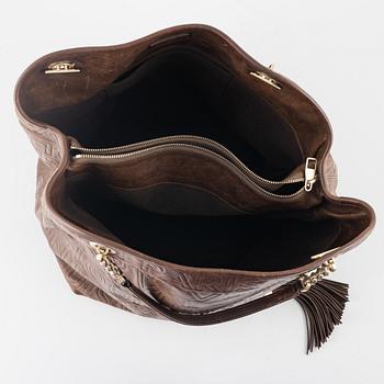 Louis Vuitton, a ' Paris Souple Whisper' embossed leather, 2008.