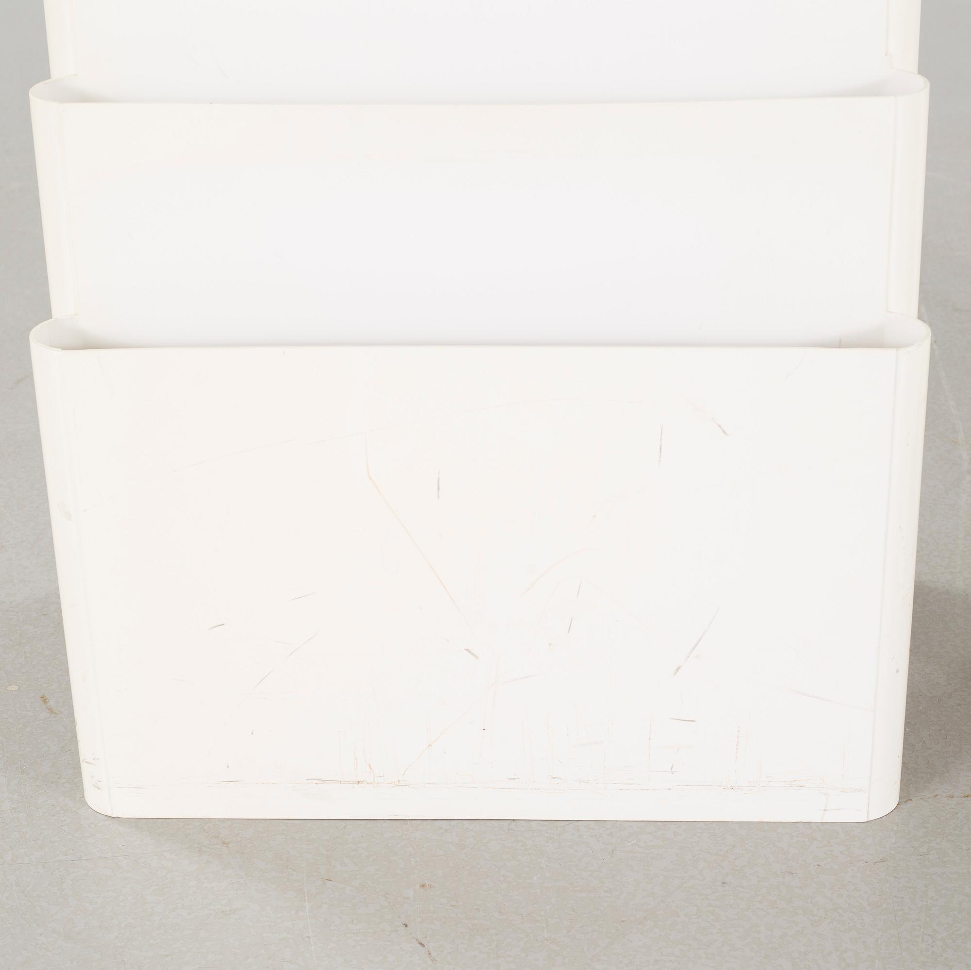 A pair of magazine racks, designed by Giotto Stoppino  for Kartell.