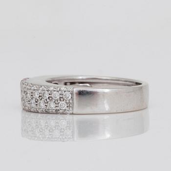 A princess-cut pink sapphire and 0.69ct brilliant-cut diamond ring.