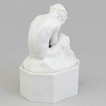 A white glazed Royal Copenhagen figure of a faun, Gerhard Henning, Denmark, early 20th Century.