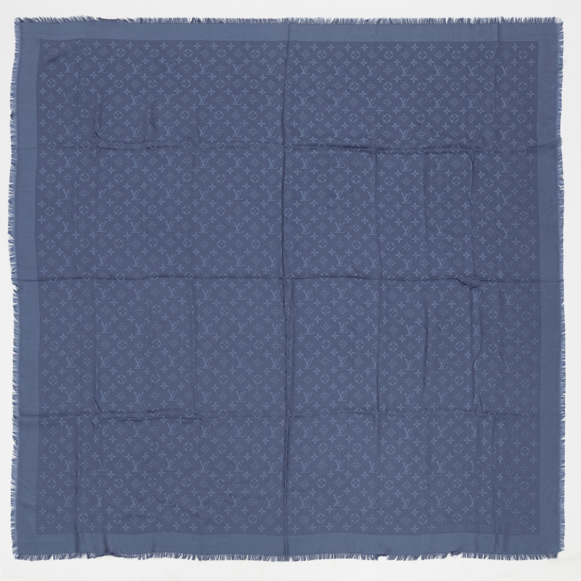Louis Vuitton, a monogram silk and wool mix shawl.