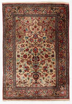 A Qum silk rug, c. 110 x 76 cm.