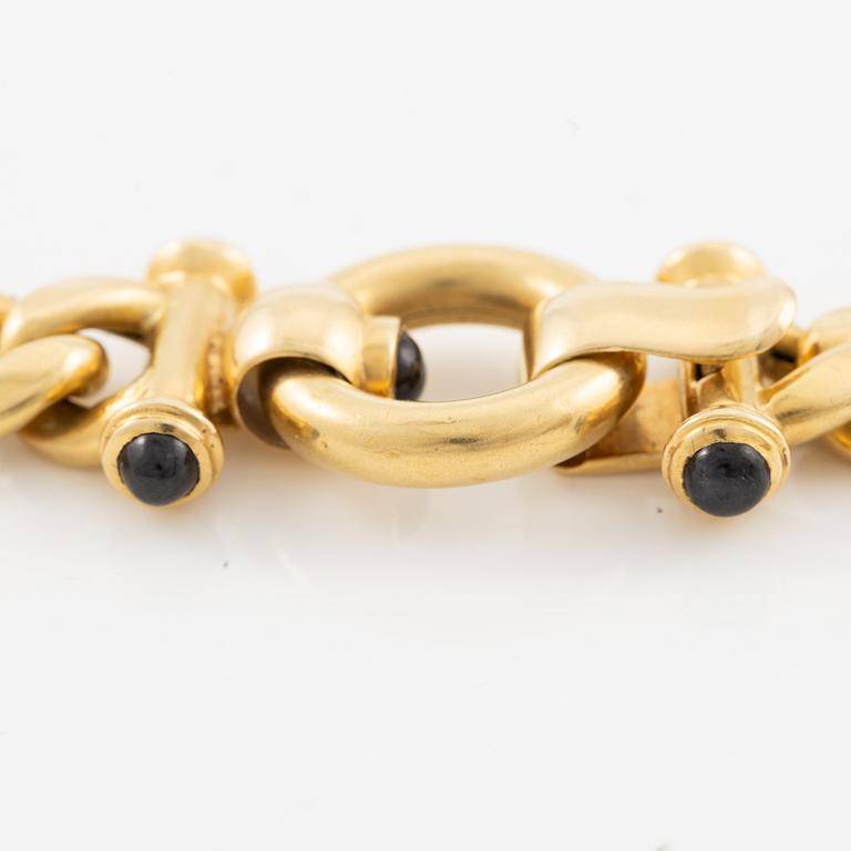 Necklace 18K gold with cabochon-cut sapphires.