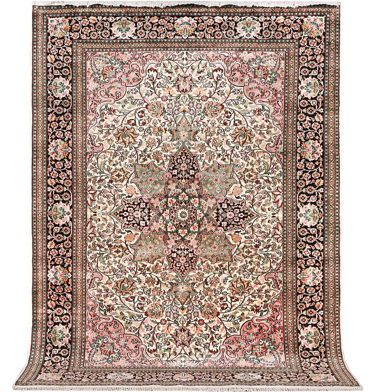 A silk Kashmir carpet, c. 267 x 185 cm.