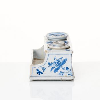 A Swedish Rörstrand faience desk set, dated Stockholm 24/10 1750.