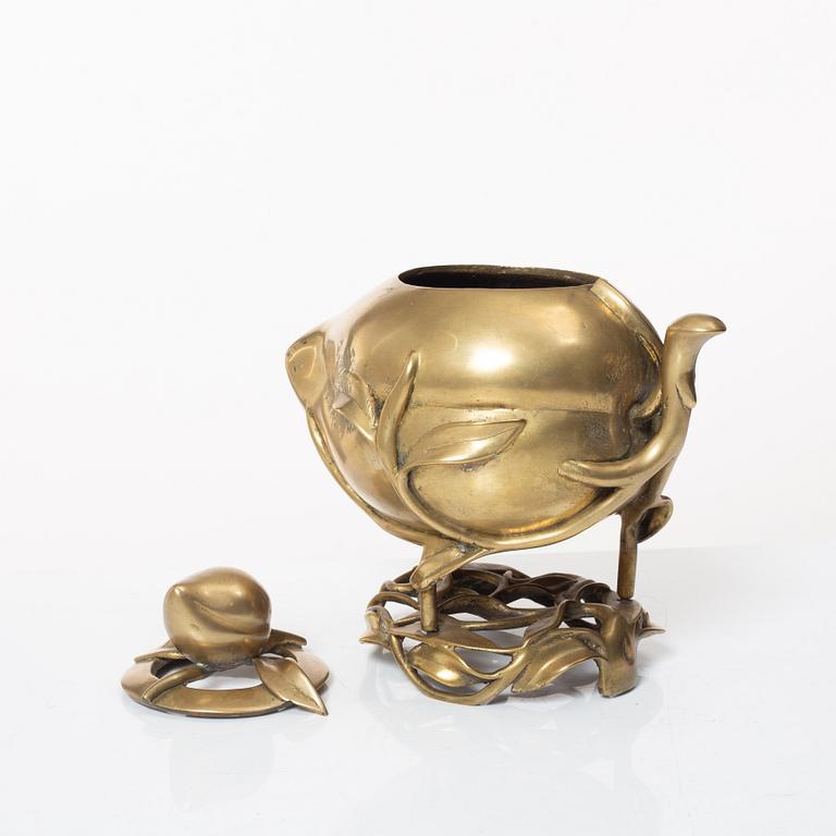 A Chinese brass 'peach' censer, first part of of the 20th century.