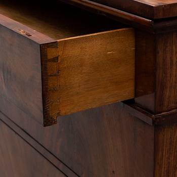 A northern european empire chest of drawers.