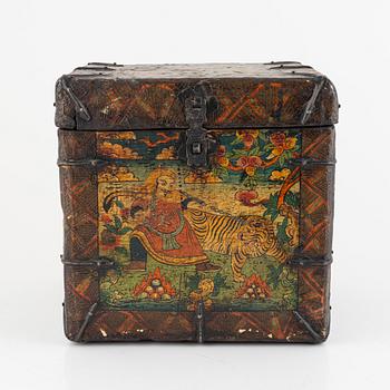 A Tibetan patinated lacquered wooden box, 20th century.
