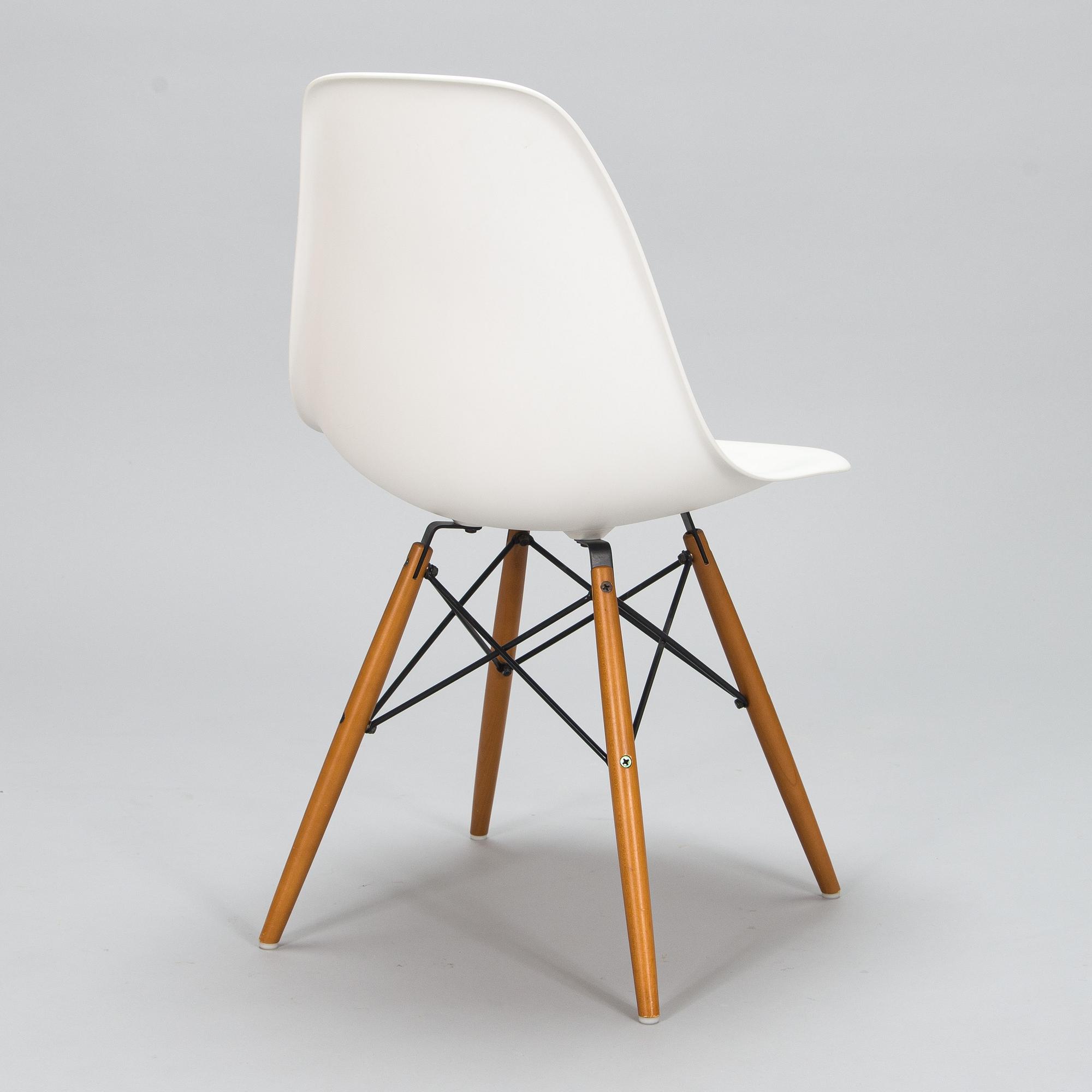 A 'Plastic chair DSW' by Charles and Ray Eames for Vitra.