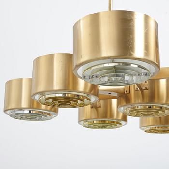 Hans-Agne Jakobsson, A Hans Agne Jakobsson twelve light brass chandelier, model T 363/12, Markaryd, Sweden 1960-70's.