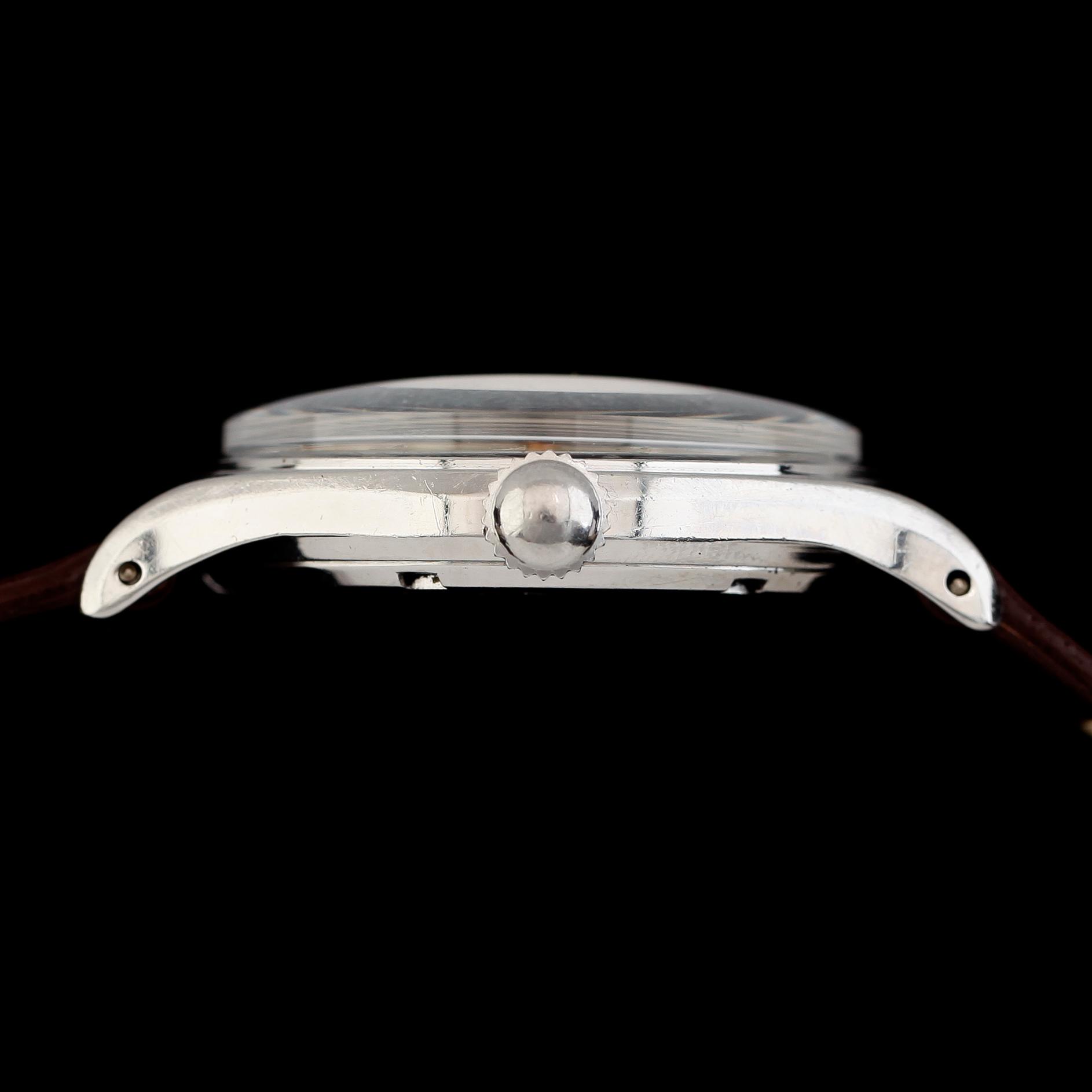 ARMBANDSUR, stål, Technos, 1900-talets mitt.