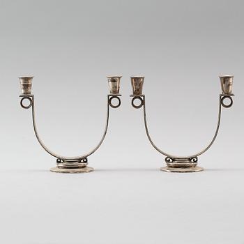 A pair of Gunlach Pedersen sterling candelabra, Georg Jensen, Copenhagen 1925-32, design nr 623.