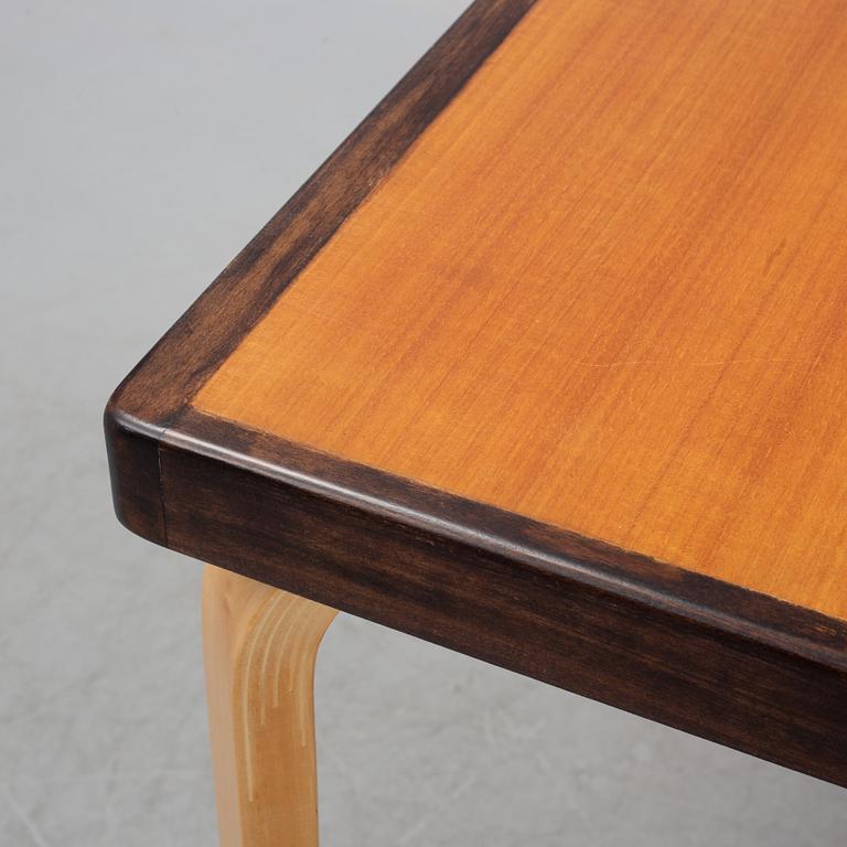 Alvar Aalto, a teak dining table, Artek, Finland, mid 20th Century.