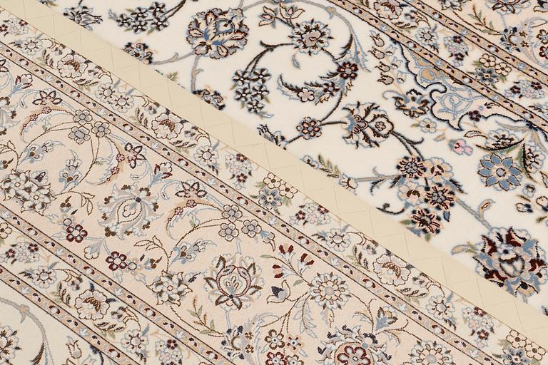 A carpet, Nain part silk s.k 6LAA, ca 310 X 209 cm.