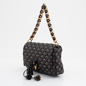 Marc Jacobs, a qulited leather handbag.