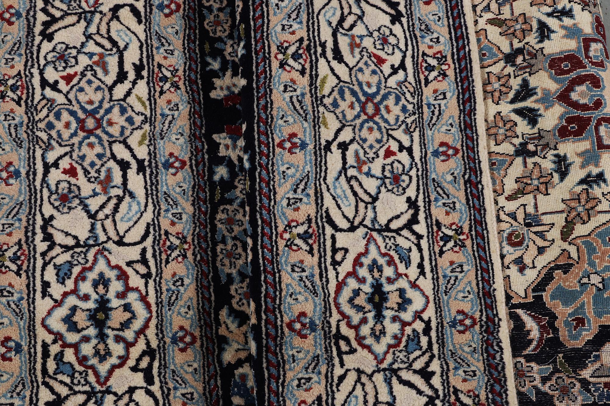 A carpet, Nain, part silk, 9 Laa, ca 295 x 197 cm.