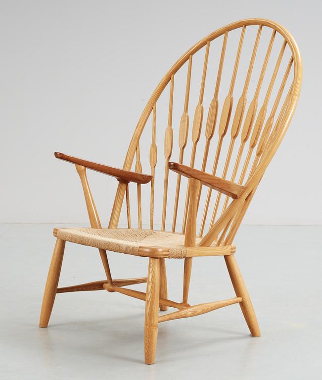 A Hans J Wegner ash and teak 'Peacock chair', Johannes Hansen, Denmark.