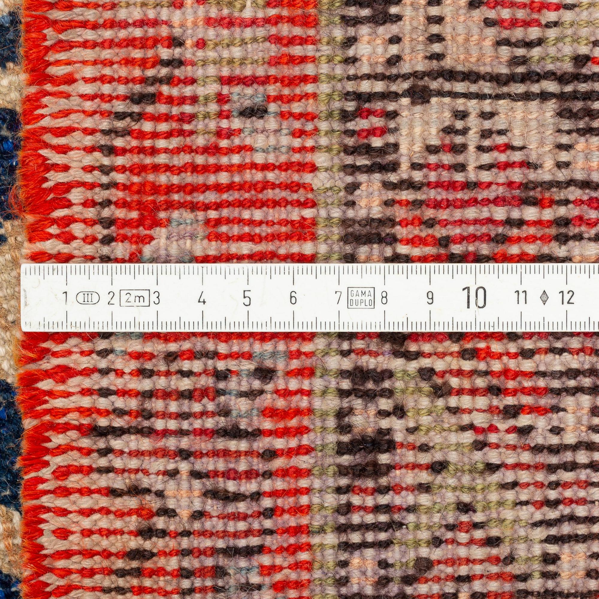 An antique Khotan carpet, Xinjiang area, China, ca 272 x 155 cm.