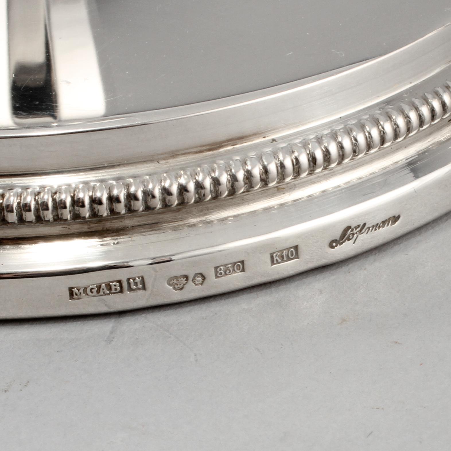 LJUSSTAKAR, ett par, silver, Eric Löfman för KG Markström, Uppsala, 1984.