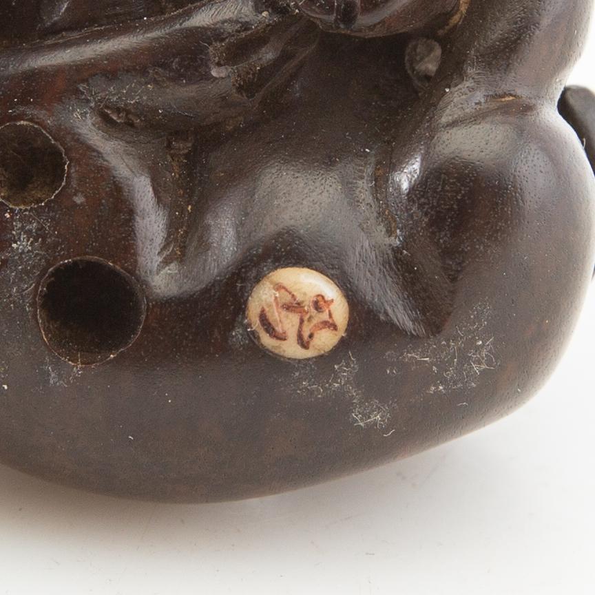 Netsuke, two pieces, hardwood. Japan, 20th century.