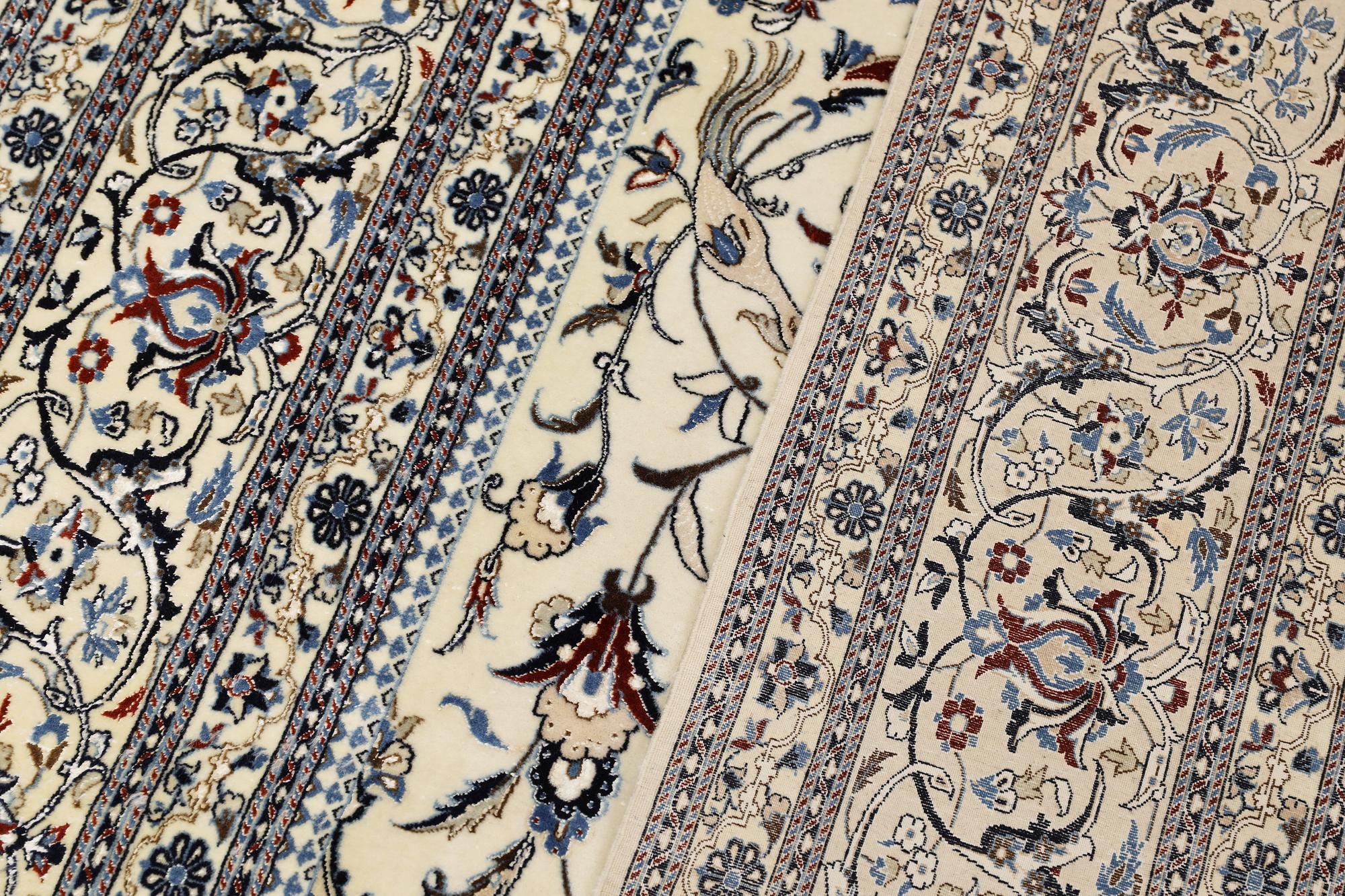 A part silk Nain carpet, so-called 6LAA, approx. 324 x 218 cm.
