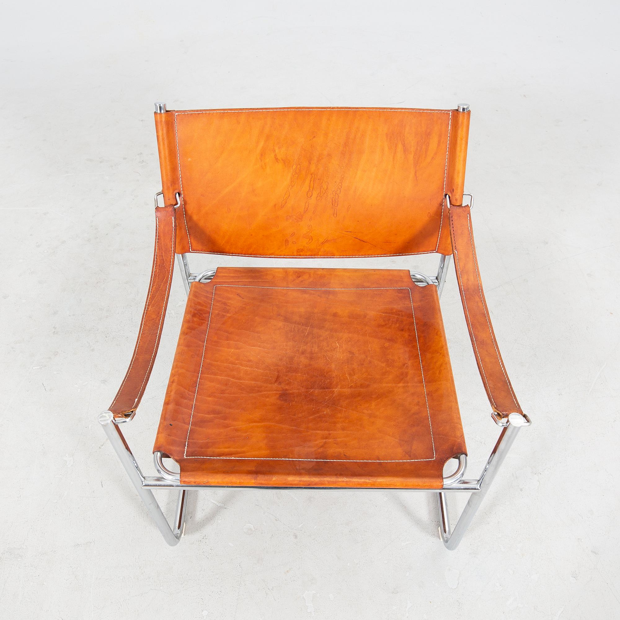 Karin Mobring, a late 20th century chrome and leather armchair from IKEA.