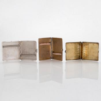 Three silver cigarette cases, incl. Nussbaum & Hunold and EL Weimann.