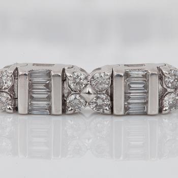 A brilliant- and baguette-cut diamond bracelet.