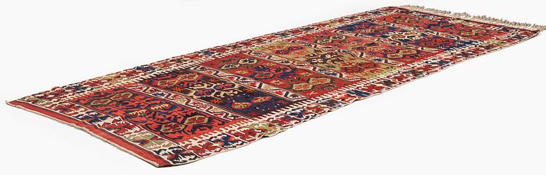 An antique southeast Anatolian kilim, c. 412 x 163 cm.