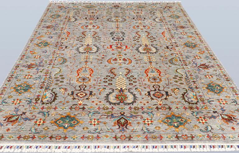 A rug, Ziegler design, approx. 240 x 172 cm.