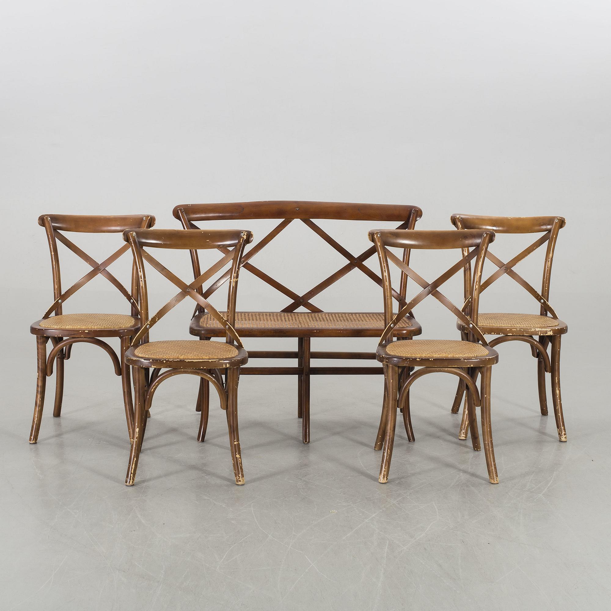 A wooden sofa, a table and four chairs, later part of the 20th century.
