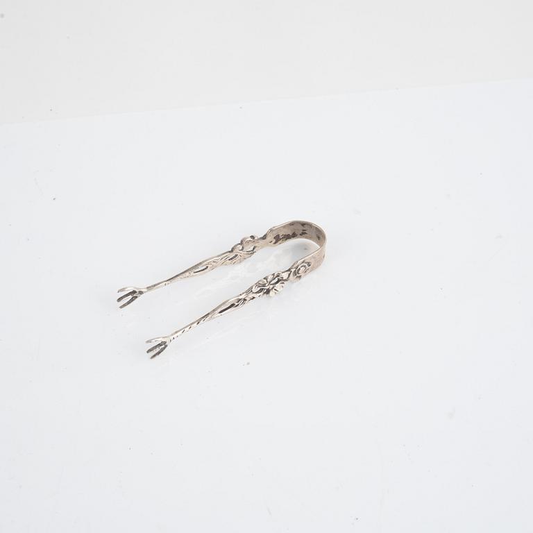 Nine pieces of silver, England, Austria and Sweden.