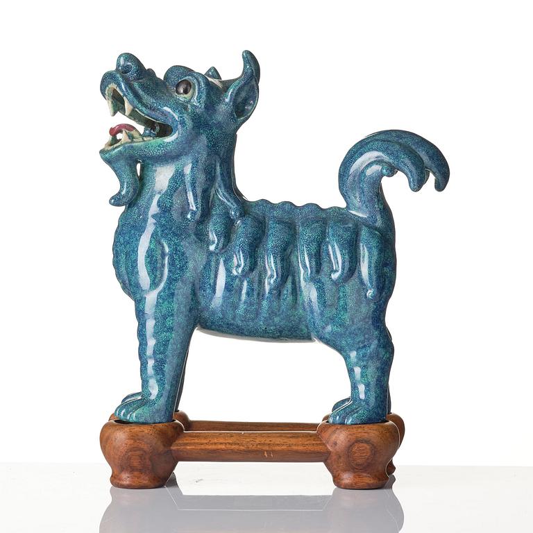A turquoise/robins egg glazed figure of a buddhist lion, Qing dynasty, Jiaqing (1796-1820).