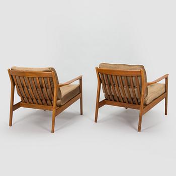 Folke Ohlsson, a pair of armchairs 'USA 75' Dux.
