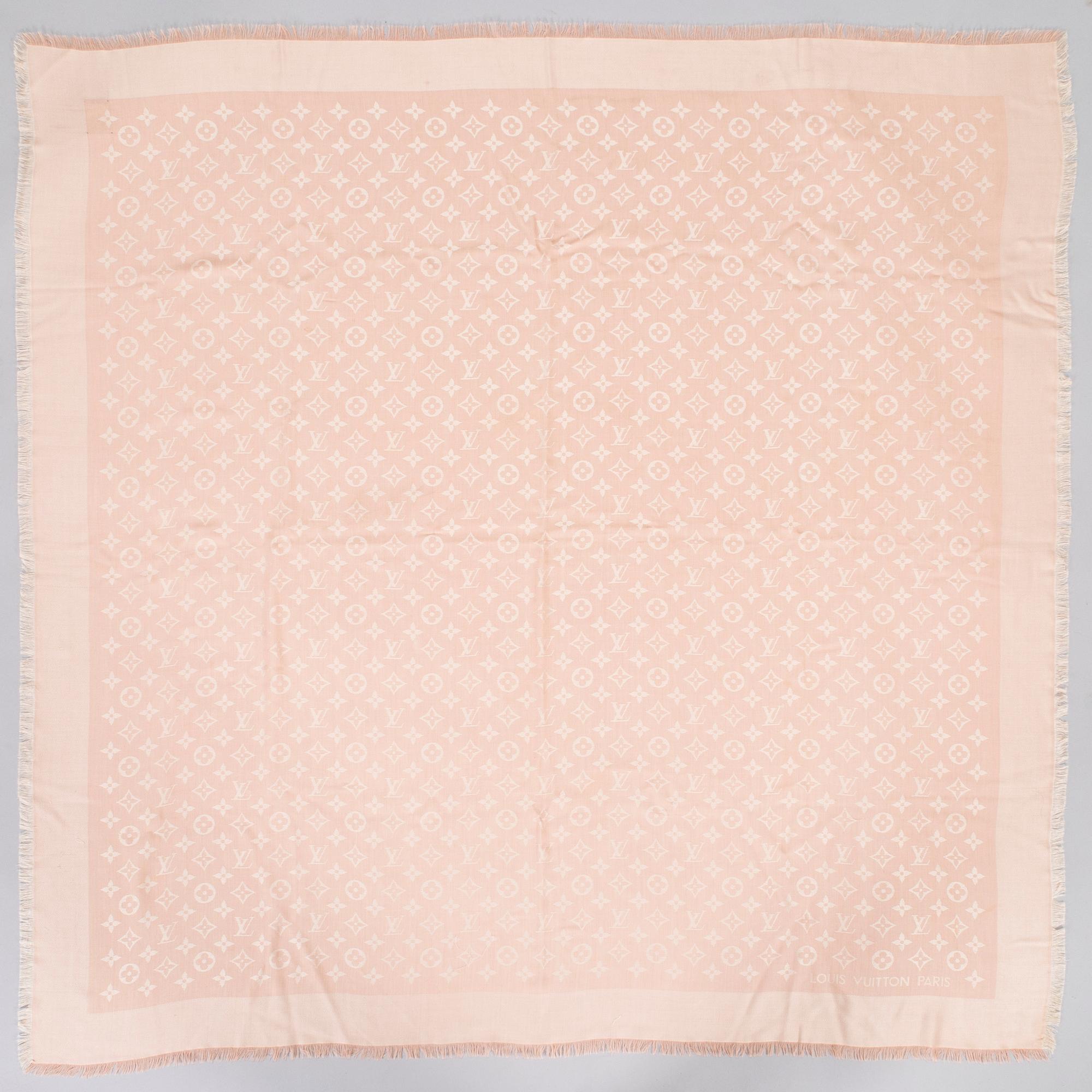 Louis Vuitton, a 'Monogram Classic Shawl'.