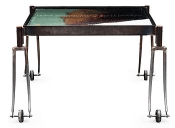 55. An Alf Linder iron and glass table, decorated with a photo and salt, by Källemo, Värnamo, Sweden 1995.