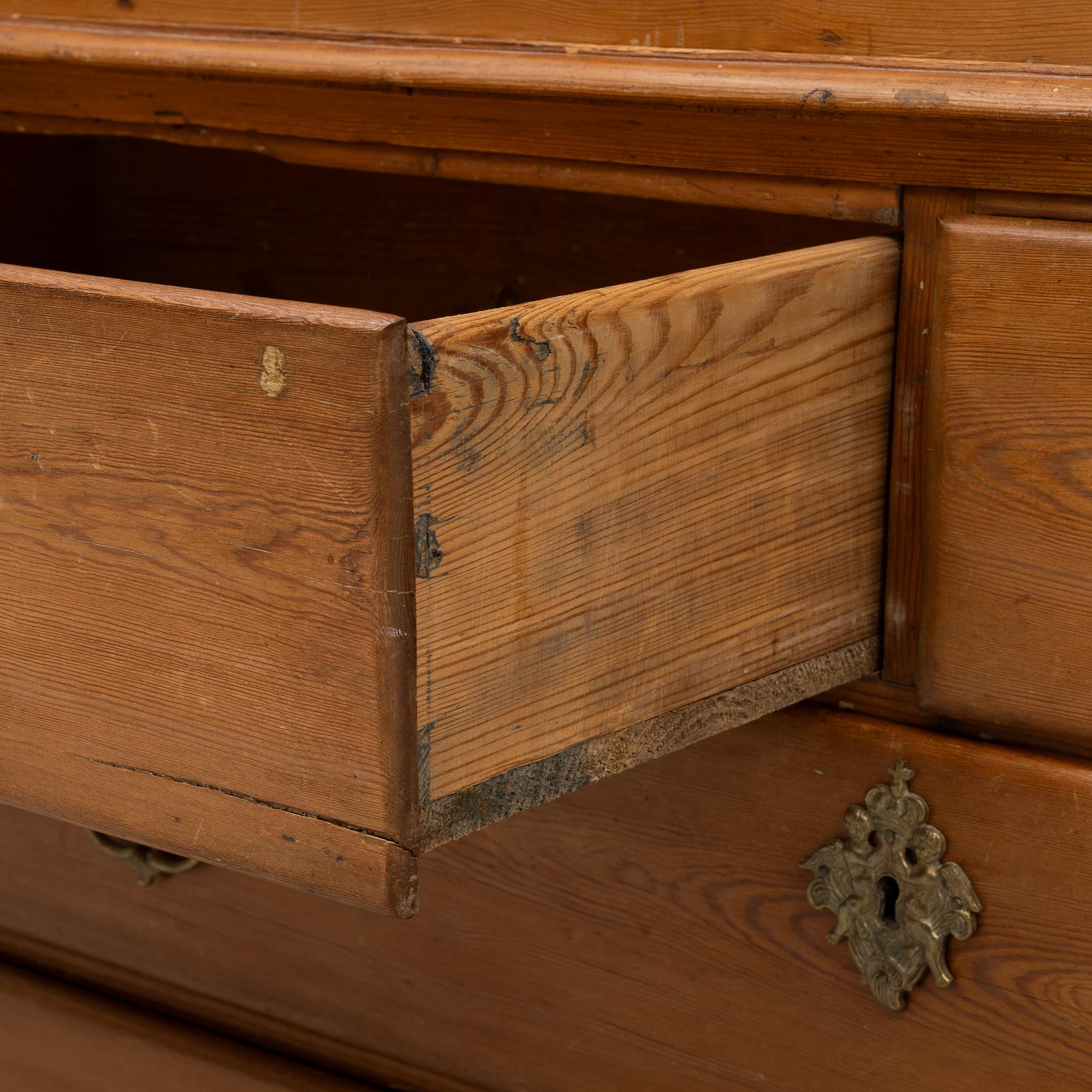 An 18th two-part pine century cabinet.