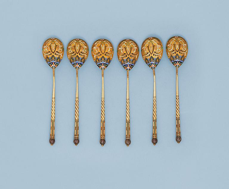 A SET OF SIX RUSSIAN SILVER-GILT AND ENAMEL TEA-SPOONS, Makers mark of 11th Artel, Moscow early 20th century.