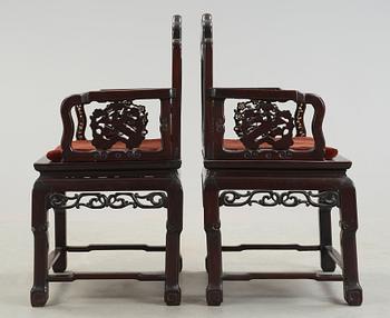 A pair of chinese hardwood and stone armchairs, first half of 20th Century.