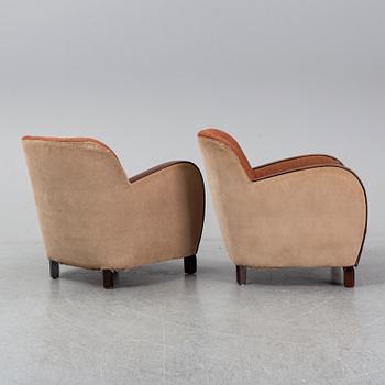 A pair of 1930's easy chairs.