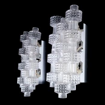 A pair of wall lamps by Gert Nyström for Fagerhult, second half of the 20th century.