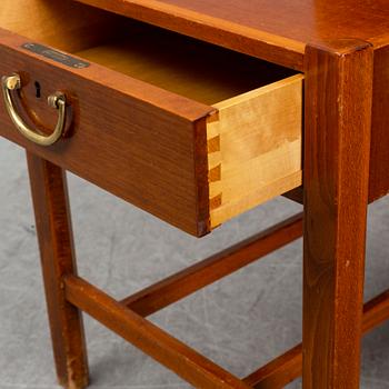 A pair of late 20th Century bedside tables.