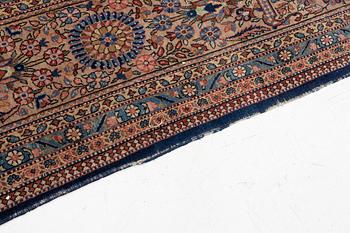 An oriental carpet, c. 425 x 305 cm.