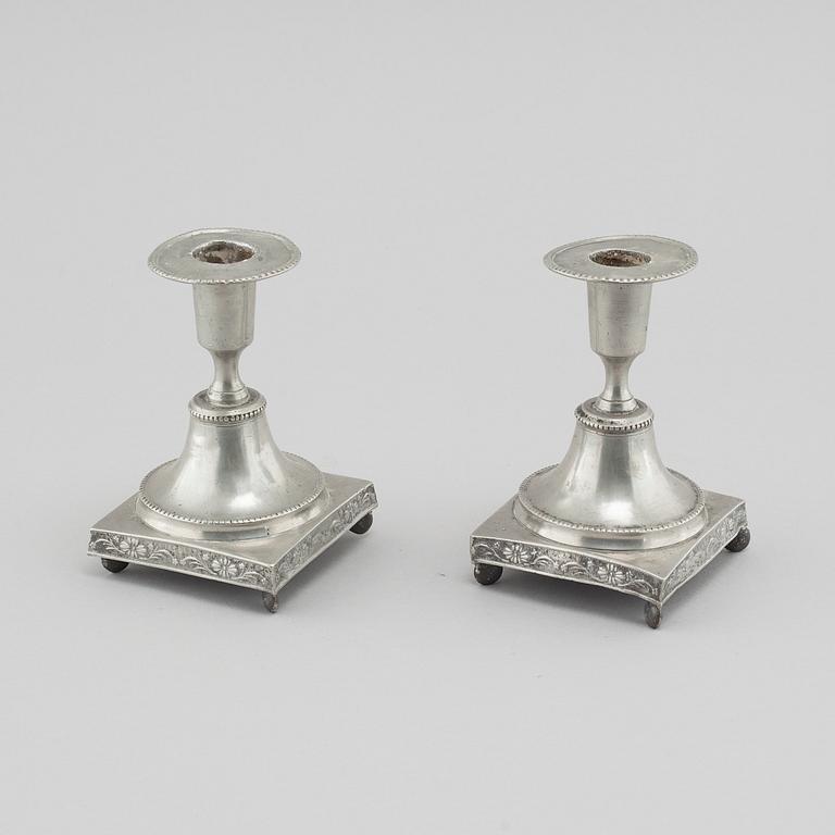 A pair of pewter candlesticks, probably by Gustaf Frederic Wigholm in Eskilstuna, first half of the 19th century.
