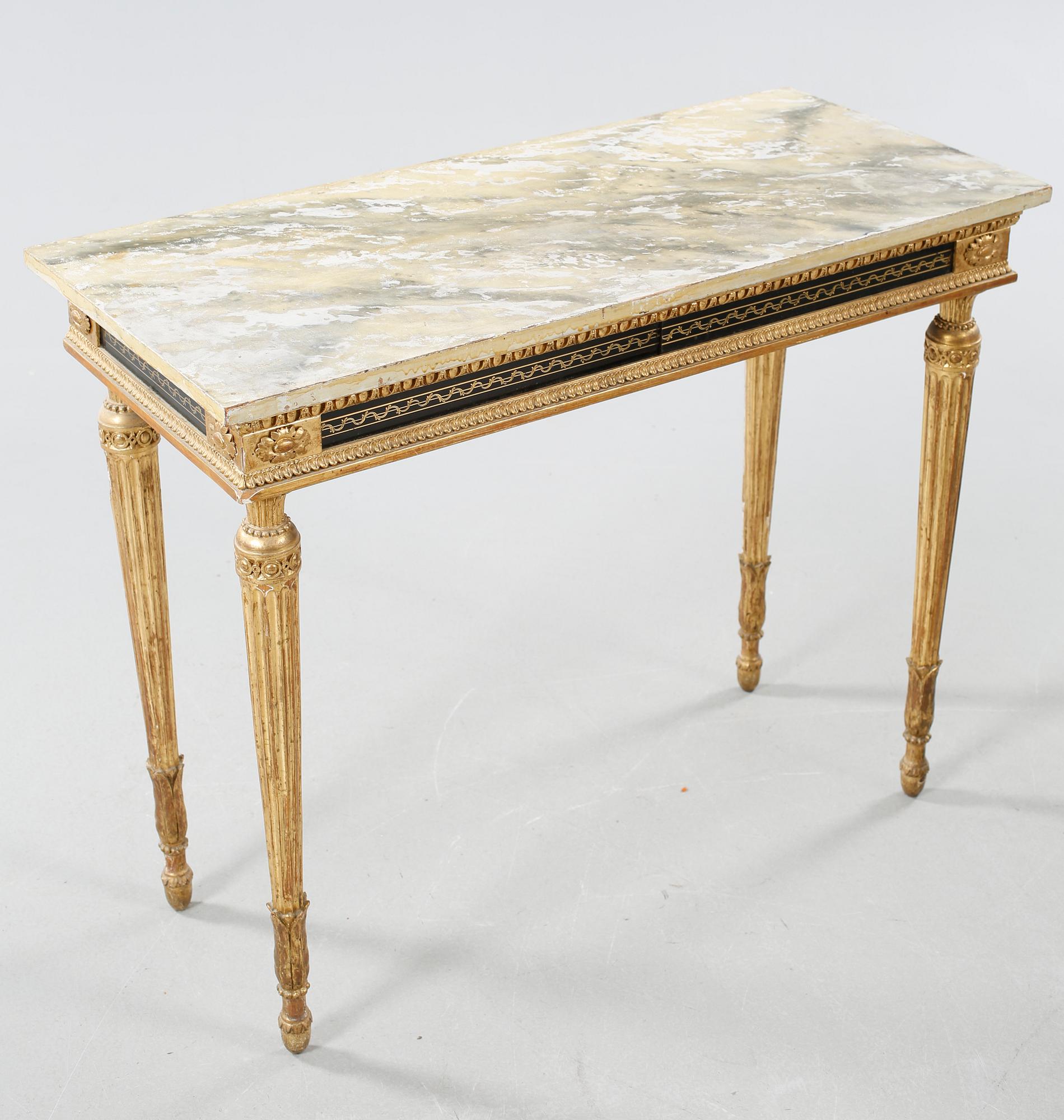 A late Gustavian table , around the year 1800.