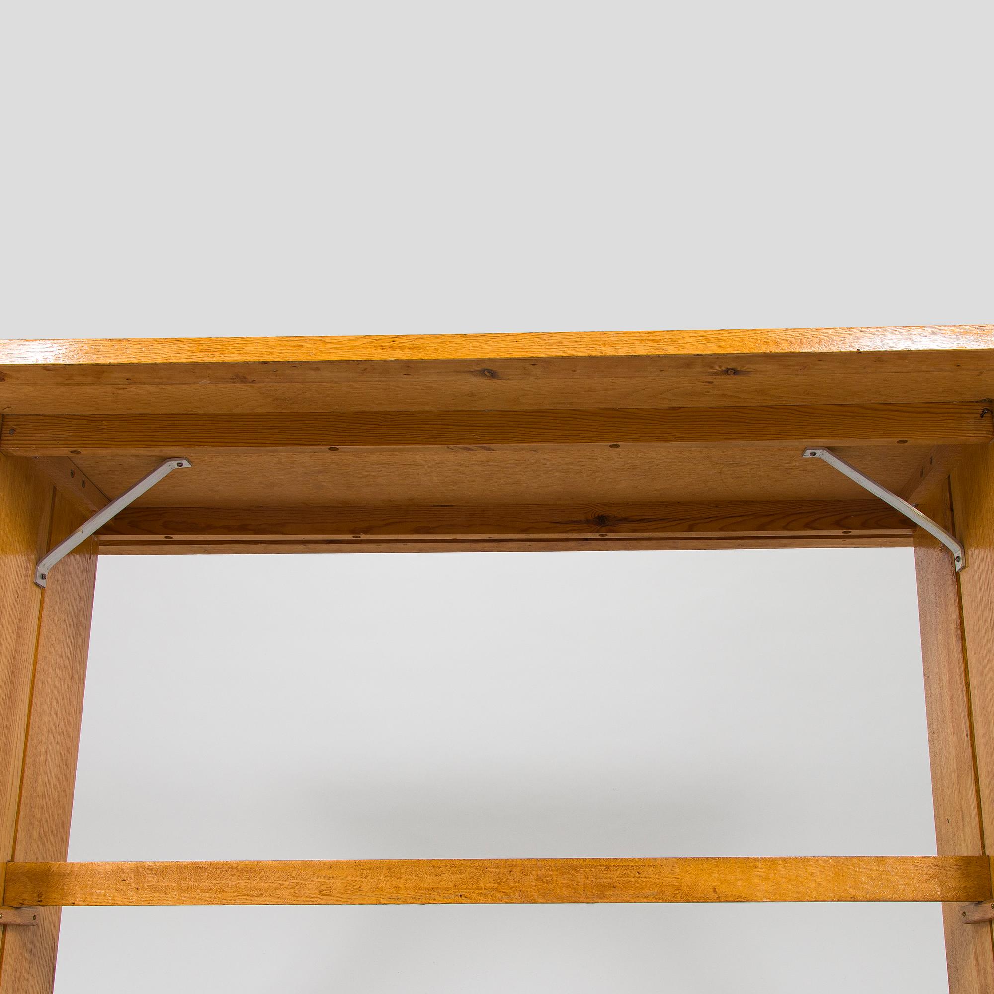 Dining table and two benches, mid-20th century.