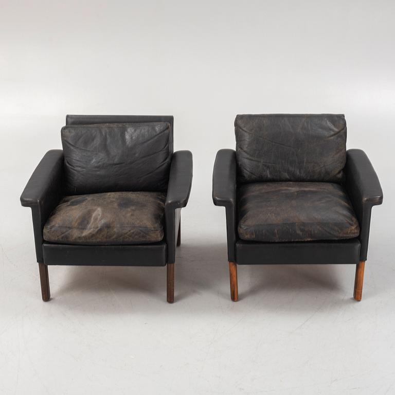 A pair of leather armchairs, Mio, Sweden, 1960's.